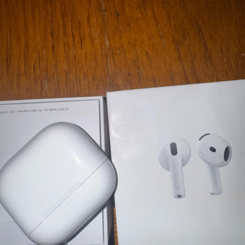 Apple Wireless Earbuds with White Charging Case